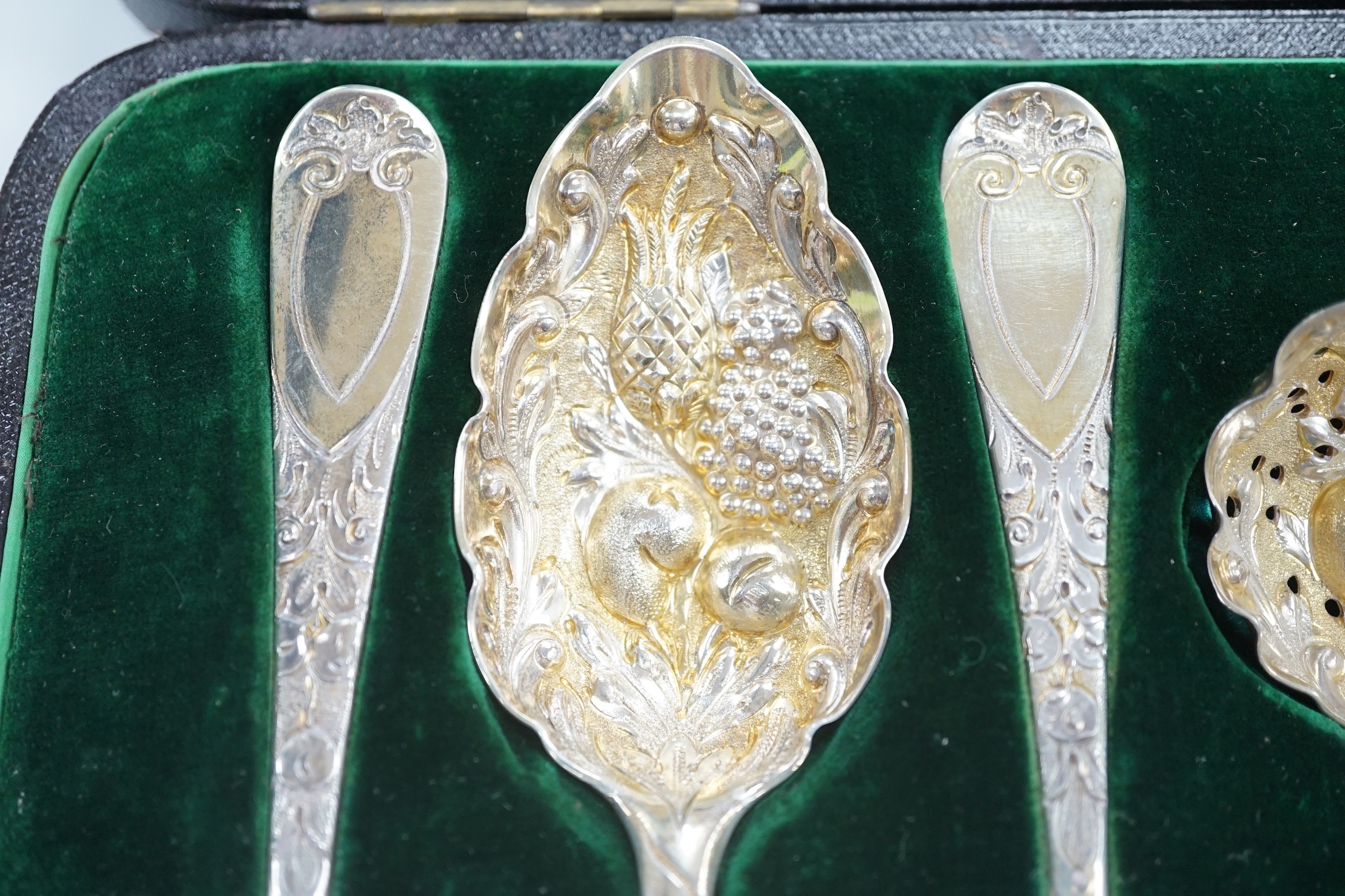 Three pairs of Georgian silver gilt Old English pattern berry spoons, 1782, 1805 and 1808 and a similar sifter spoon, 1798, in fitted case, 12.8oz.